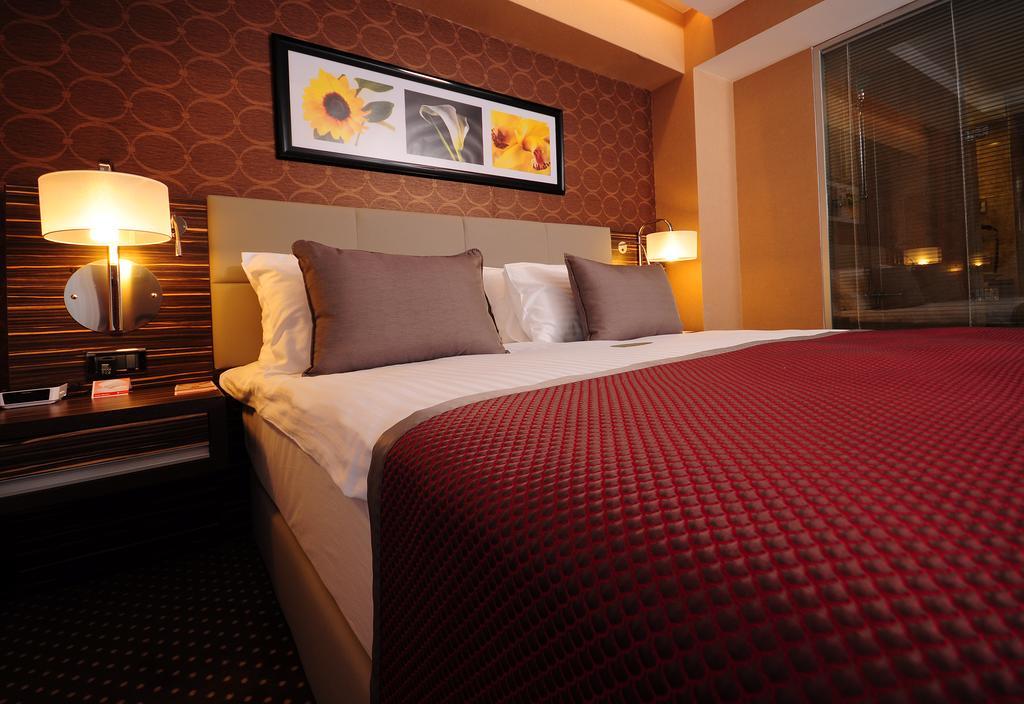 Отель Ramada Plaza By Wyndham Izmit Коджаэли Экстерьер фото A bedroom