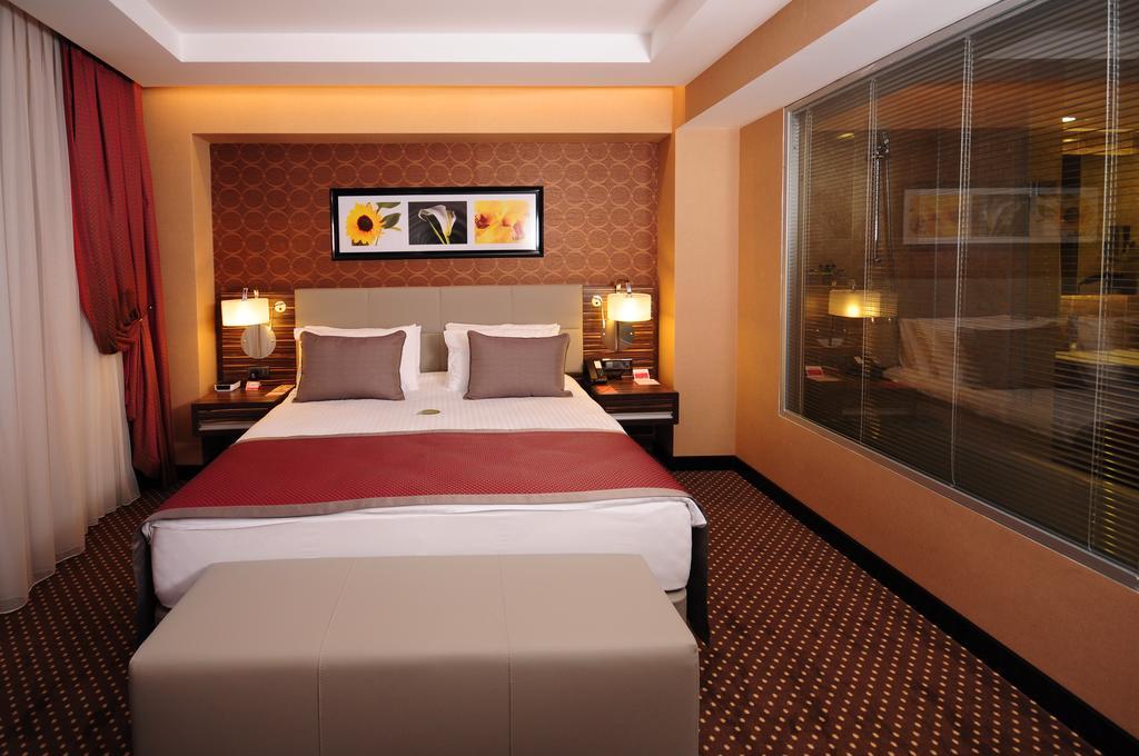 Отель Ramada Plaza By Wyndham Izmit Коджаэли Номер фото A room at the hotel